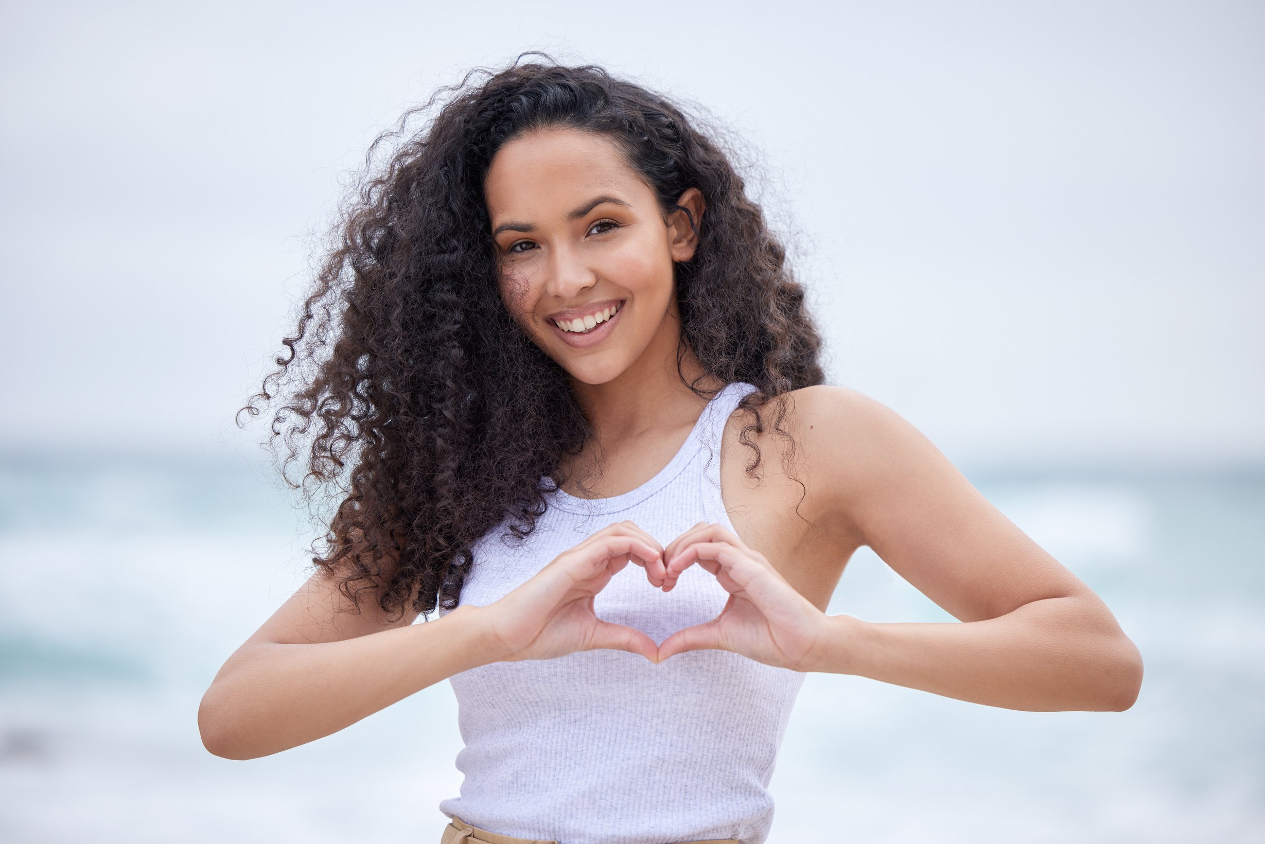 Love Yourself before Anything Else. Shot of a Young Woman Making